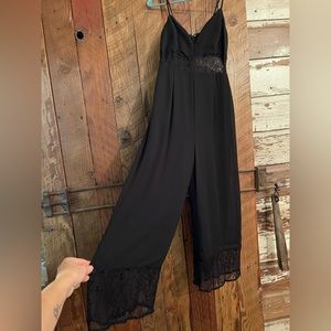 NWOT BEBE jumpsuit size 0